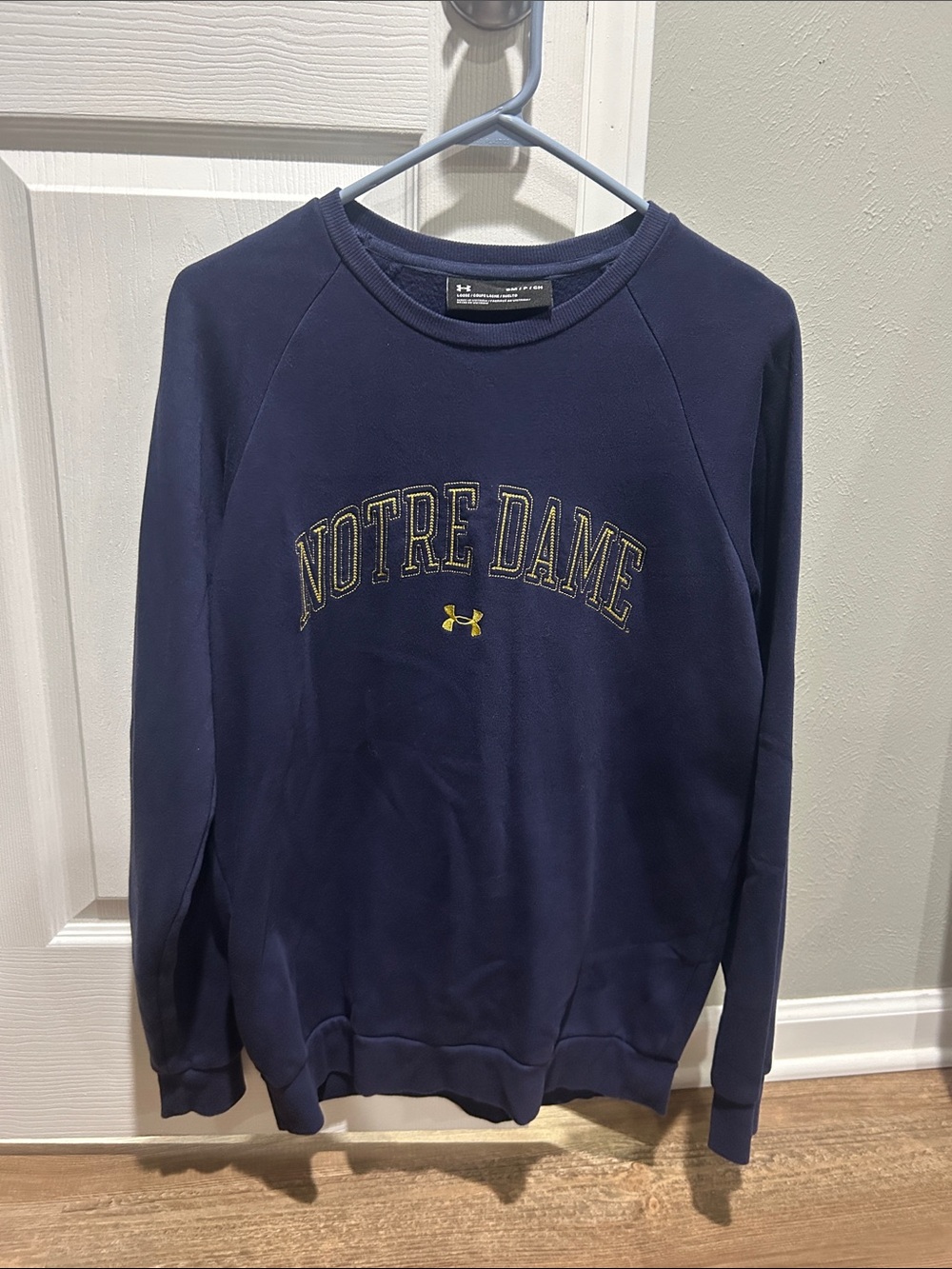 Women’s Under Armour Navy Notre Dame Crewneck Sweatshirt w/ EmbroideredGold Logo